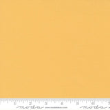 Warm golden yellow quilting cotton fabric in the Afternoon colour, featuring a smooth, even solid finish with no printed pattern or additional colours.