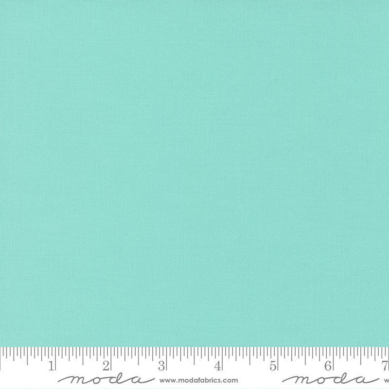 Aqua Bella Solid from Moda Fabrics is a fresh, soothing aqua-blue solid cotton with a soft, watery tone.