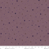Seeing Stars Basic Purple fabric featuring scattered plum, mauve, taupe and charcoal stars on a muted dusty purple background.