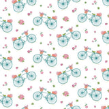 Nutex Floral Dreams Bikes White cotton fabric featuring colourful floral bicycles scattered across a white background.