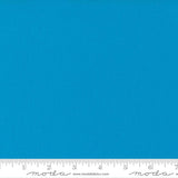 Bright turquoise blue quilting cotton fabric in the Bright Turquoise colour, featuring a smooth, even solid finish with no printed pattern or additional colours.