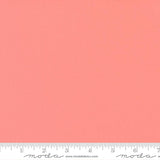 Carnation pink quilting cotton fabric featuring a smooth, even solid finish with no printed pattern or additional colours across the surface.