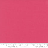 Bright pink quilting cotton fabric in the Chrysanthemum colour, featuring a smooth, even solid finish with no printed pattern or additional colours.