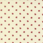 Moda Joyful Gatherings II 49332 11 cream fabric with tiny red poinsettia flowers and small dark green stems in an all-over repeat.