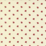 Moda Joyful Gatherings II 49332 11 cream fabric with tiny red poinsettia flowers and small dark green stems in an all-over repeat.