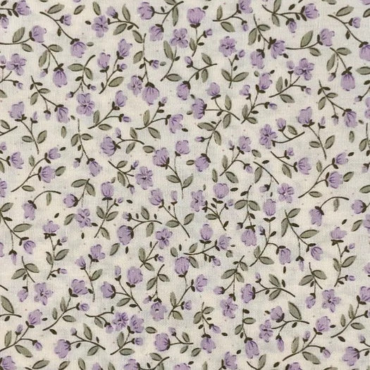 A pretty small-scale floral print from Sevenberry, featuring delicate lavender-purple blossoms scattered across a soft cream background. Fine olive-grey trailing stems and tiny leaves weave throughout the design, giving the fabric a gentle, natural flow.

With its soft colouring and dainty cottage-garden style, this print is ideal for quilting, patchwork, dressmaking accents, linings, small accessories, and sweet vintage-inspired sewing projects.