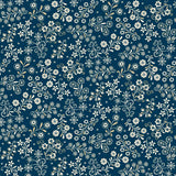 Blue and cream fabric featuring a detailed digital floral vine print with leafy branches and small flower details across the fabric. The pattern combines soft cream tones with blue vines and floral accents, creating a charming Nordic holiday-inspired design with a natural and elegant look.