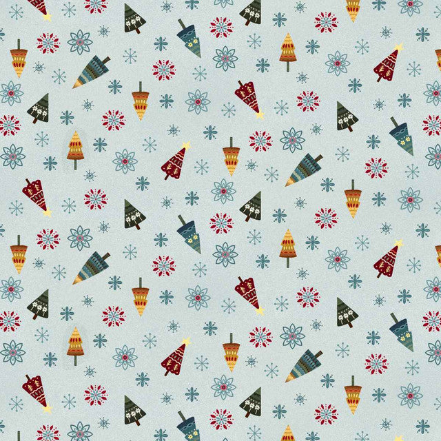 Ice-blue Christmas fabric featuring a playful assortment of stylised evergreen trees in red, blue, teal, sage, green and cream, scattered with tiny snowflakes and wintry accents.