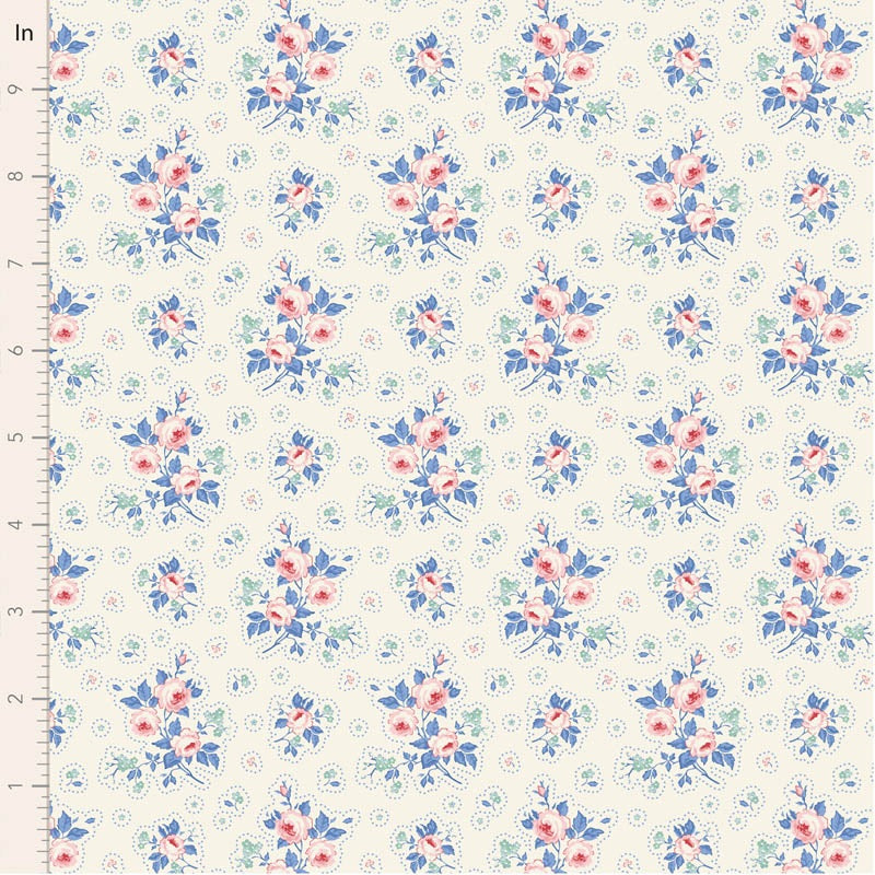 Cream quilting cotton fabric featuring bouquets of pink roses with blue and green leaves, surrounded by small blue floral sprigs and dotted circles.