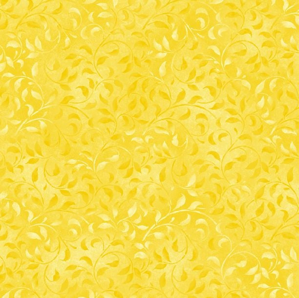 Golden Yellow Vine fabric by Wilmington Prints features delicate, scrolling vine motifs in warm golden-yellow tones, forming an elegant all-over botanical pattern.
