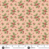 Strawberry cream Christmas quilting cotton fabric featuring green holly branches and clusters of red berries scattered across a pale pink background with smaller holly sprigs.
