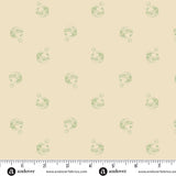 Cream Christmas quilting cotton fabric featuring small sage green jingle bells scattered across a warm cream background with curled hanging loops and decorative stripes.