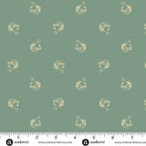 Vintage blue Christmas quilting cotton fabric featuring small cream jingle bells scattered across a muted blue background with curled hanging loops and decorative stripes.
