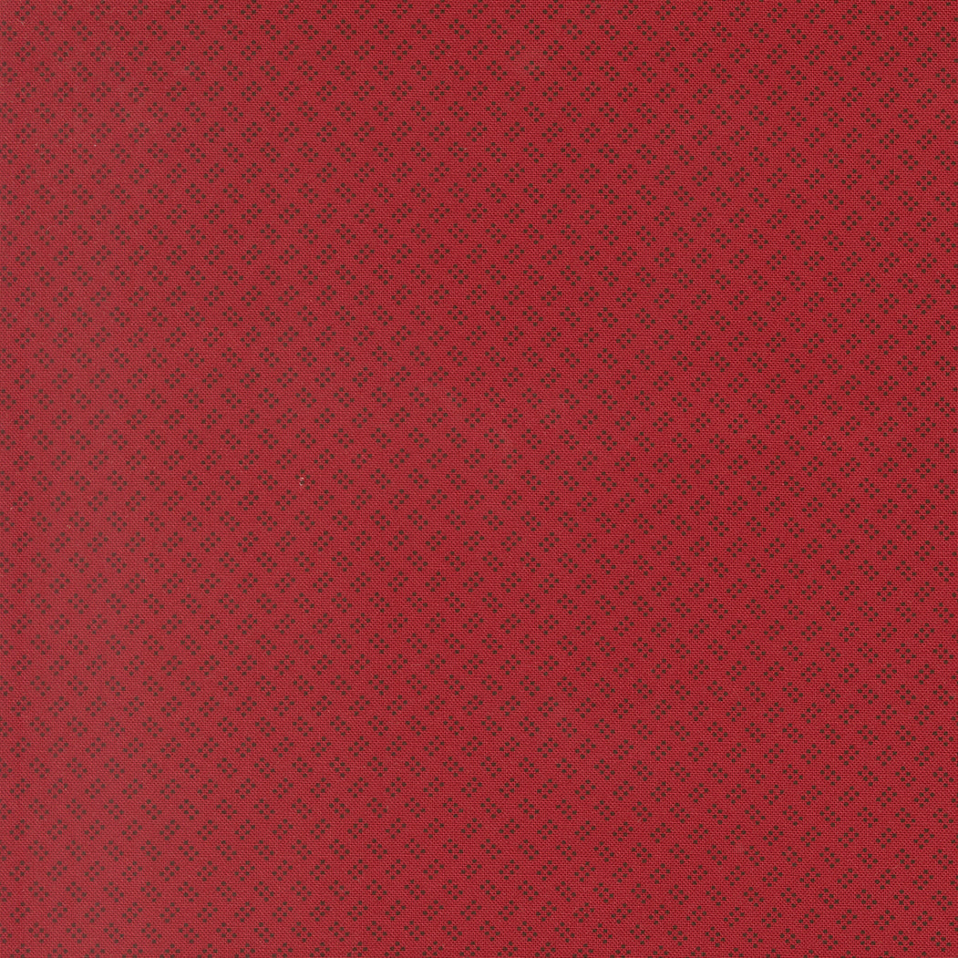 Red tonal quilting fabric with a fine all-over pattern of tiny dark speckles, SKU 49330 13.