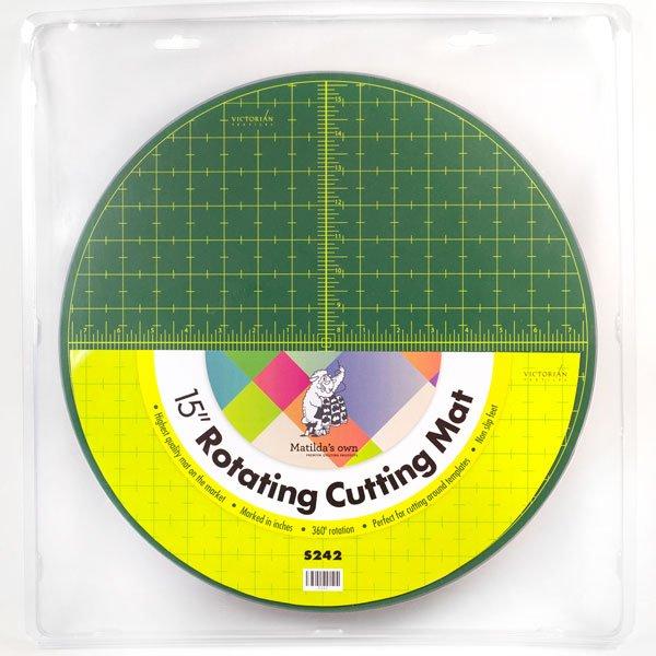 15-inch rotating cutting mat with grid pattern on a white background