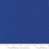 Rich sapphire blue quilting cotton fabric in the Sapphire colour, featuring a smooth, even solid finish with no printed pattern or additional colours.