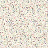 Slow & Steady Toss DV7422 fabric featuring tiny scattered wildflowers, leaves and buds in pink, lavender, blue, green, peach and yellow on a warm cream background.