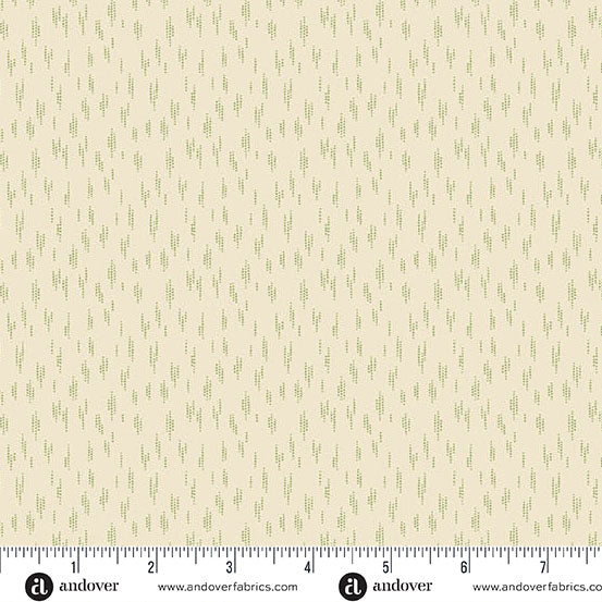 Cream Christmas quilting cotton fabric featuring small sage green dotted lines scattered across a warm cream background, resembling a light shower of falling snow.