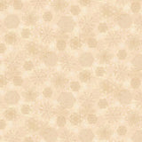 Cream Christmas fabric featuring an assortment of intricately detailed snowflakes in soft ivory, beige and pale gold tones, scattered across a warm mottled cream background with tiny white dots resembling falling snow.