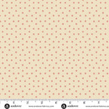 Pink and cream Christmas quilting cotton fabric featuring small five-point stars in shades of pink scattered across a warm cream background.