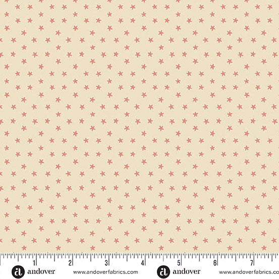 Pink and cream Christmas quilting cotton fabric featuring small five-point stars in shades of pink scattered across a warm cream background.
