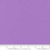 Soft plum purple quilting cotton fabric in the Sugar Plum colour, featuring a smooth, even solid finish with no printed pattern or additional colours.