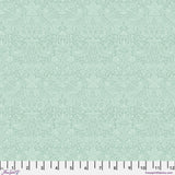 Blue-green quilting cotton fabric featuring pairs of pale blue birds among strawberries, flowers and curling leaves across a soft blue-green background.