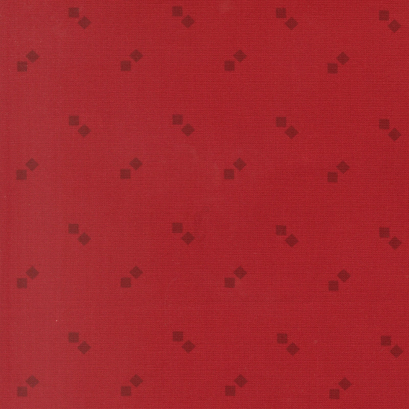 Moda Joyful Gatherings II 49339 12 red tonal fabric with scattered pairs of small dark red diamond motifs.