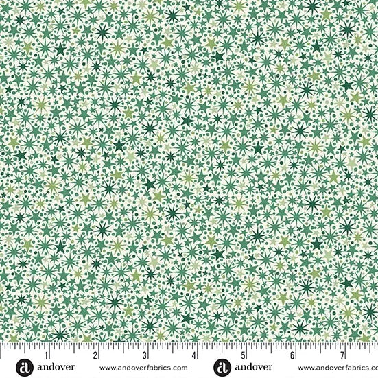 A lively all-over scatter of small stars, dots, and twinkling starburst motifs in rich green tones on a pale background. M2250G