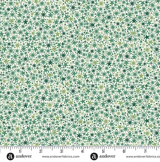 A lively all-over scatter of small stars, dots, and twinkling starburst motifs in rich green tones on a pale background. M2250G
